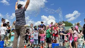 Bubble Guy with massive bubbles and giggling kids