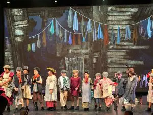 Actors in period dress for Oliver