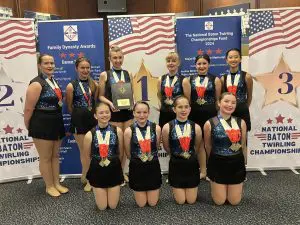 baton Twirlers National Champs group of young ladies with medallions around their necks