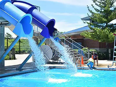 a water slide in a pool