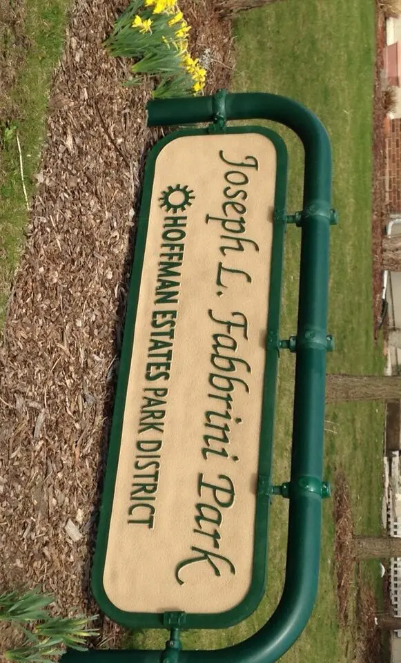 a sign in a park