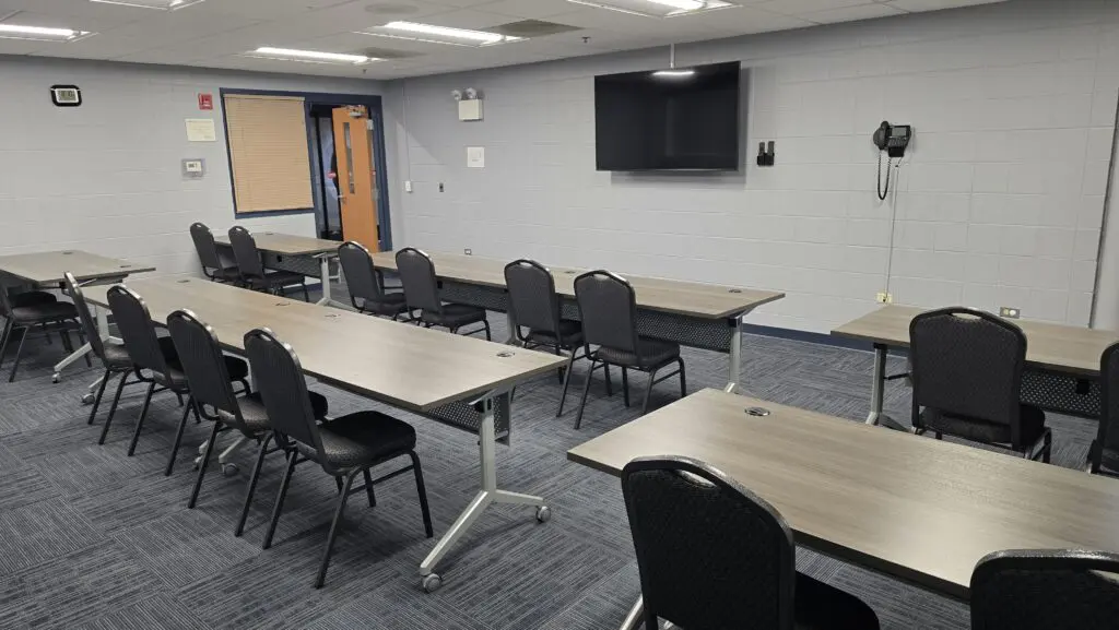 a room with tables and chairs