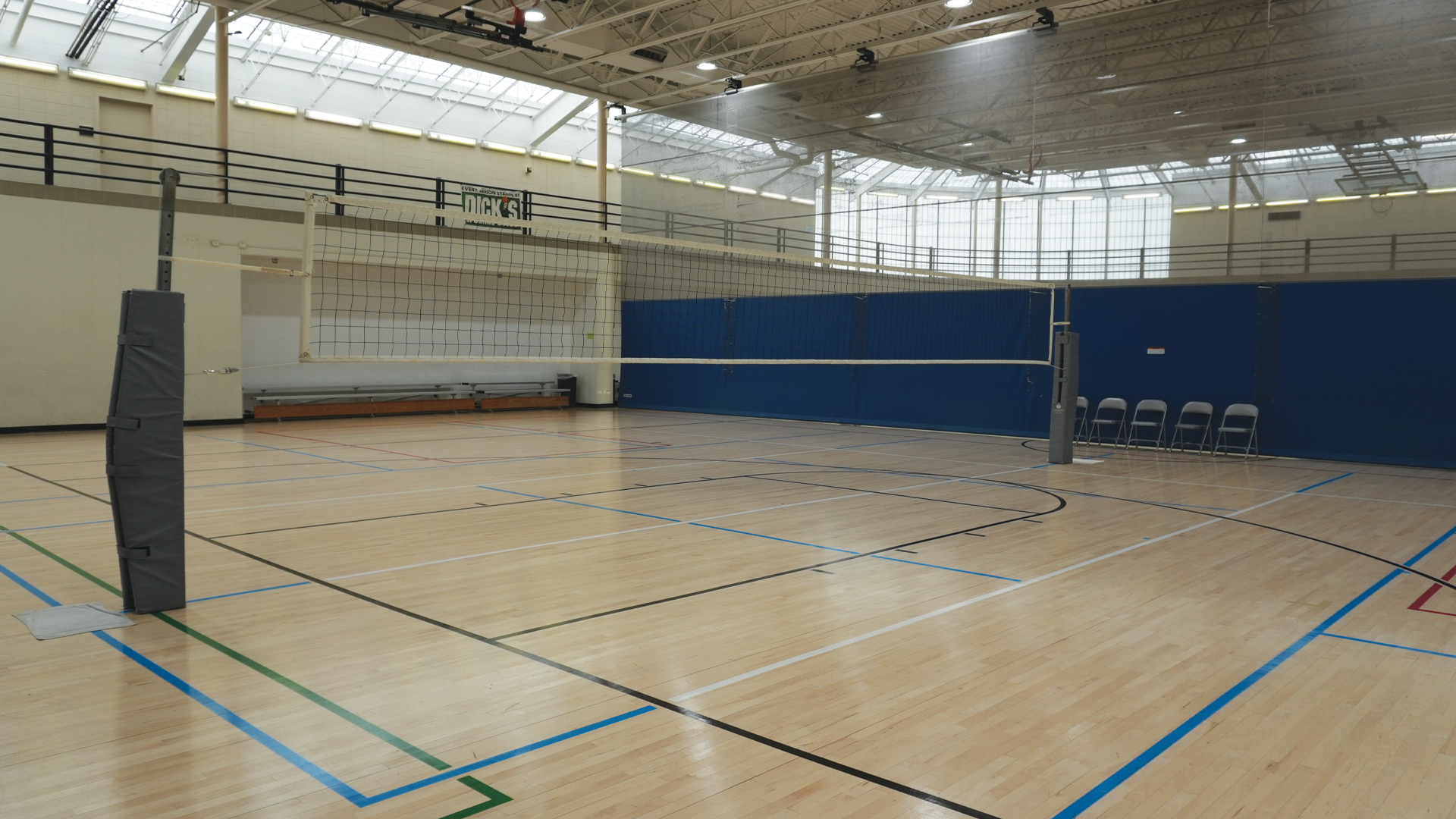 a volleyball court inside a gym
