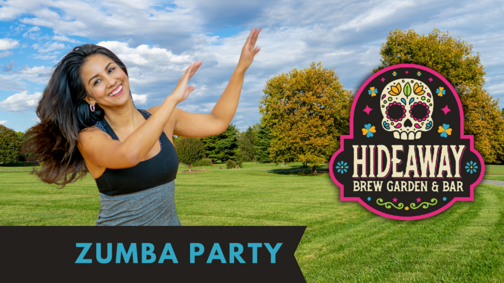 A woman taking a Zumba class in the park
