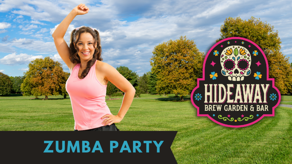 A woman taking a Zumba class in the park