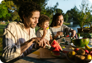 Family enjoying outdoor activities together at a park